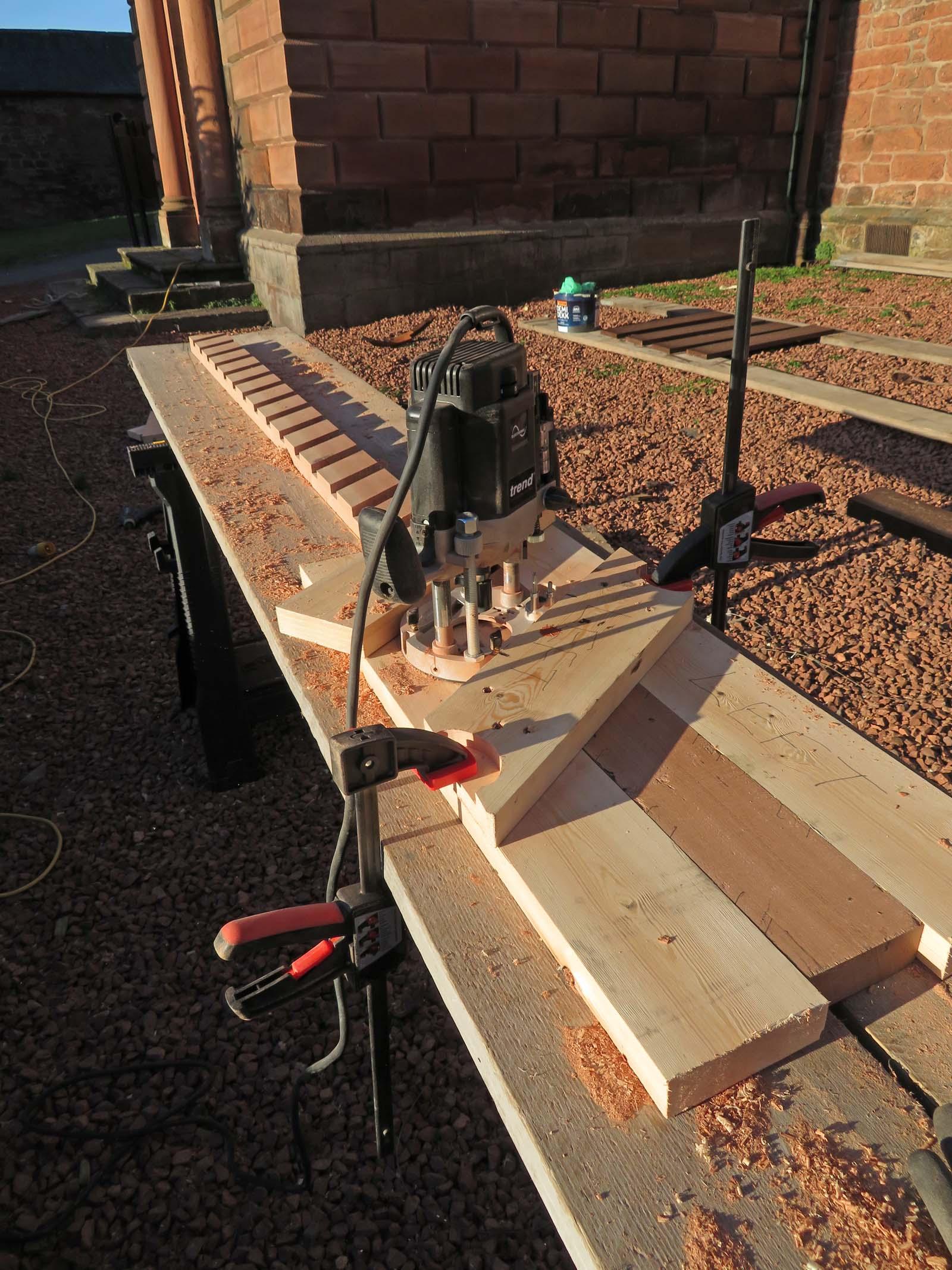 using router to cut louvre slats into timbers